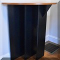 F19. Demilune "triangle"table with lacewood top.